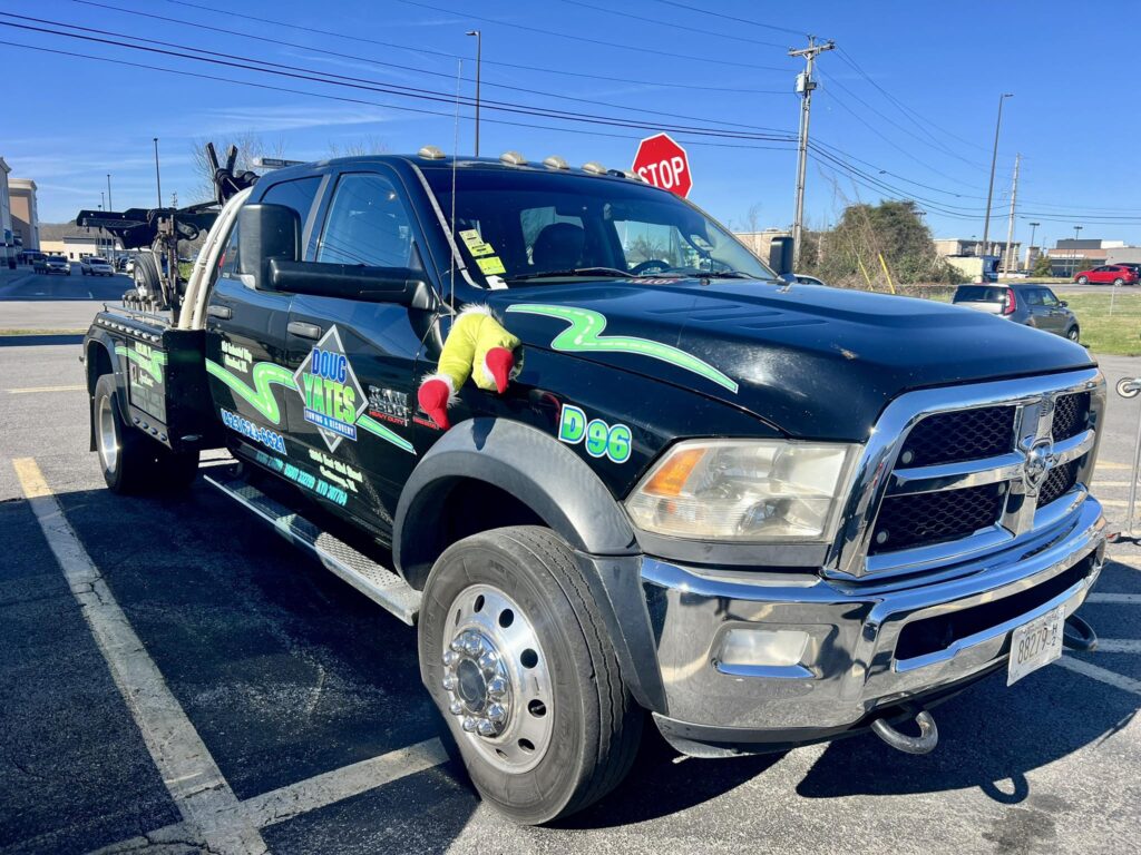 Yates truck with grinch on side | Doug Yates Towing and Recovery