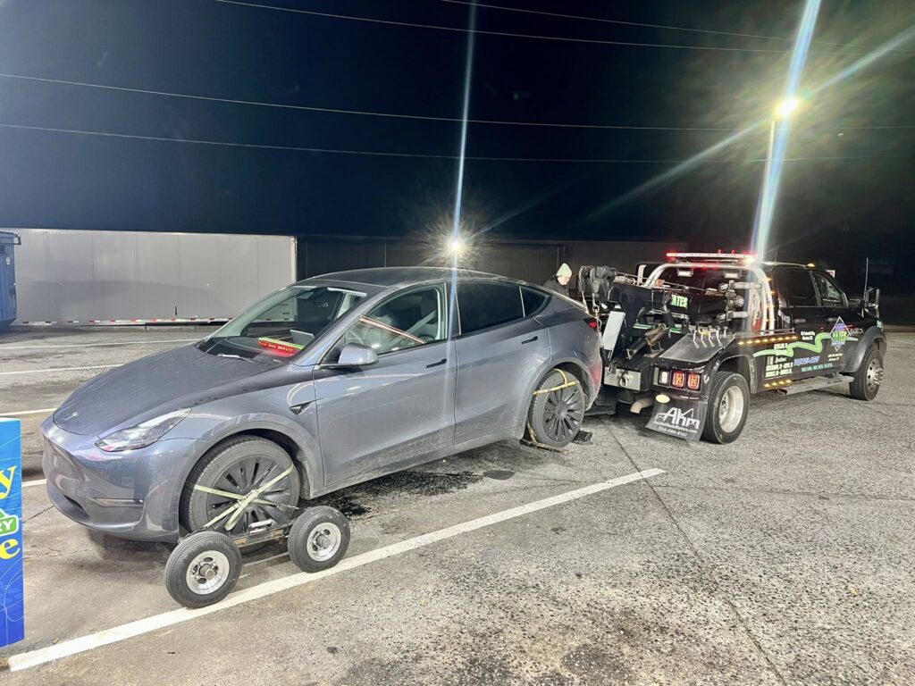 Yates truck towing sedan